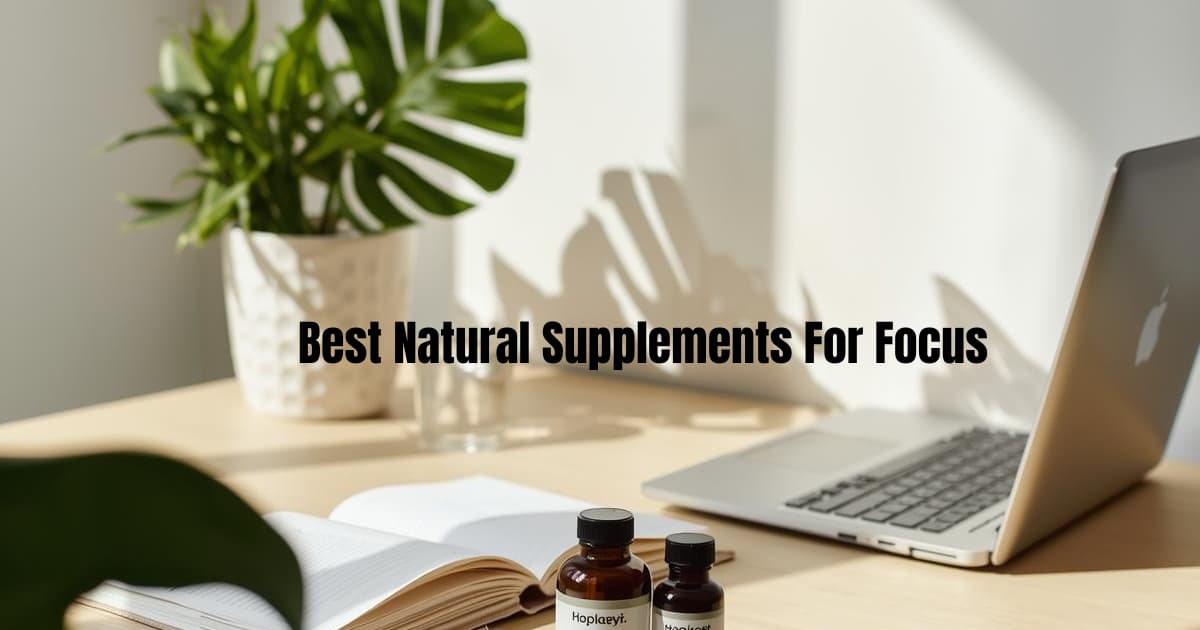 Natural herbal supplements for focus and concentration on a clean home office desk with notebook, laptop, and green plant in sunlight.